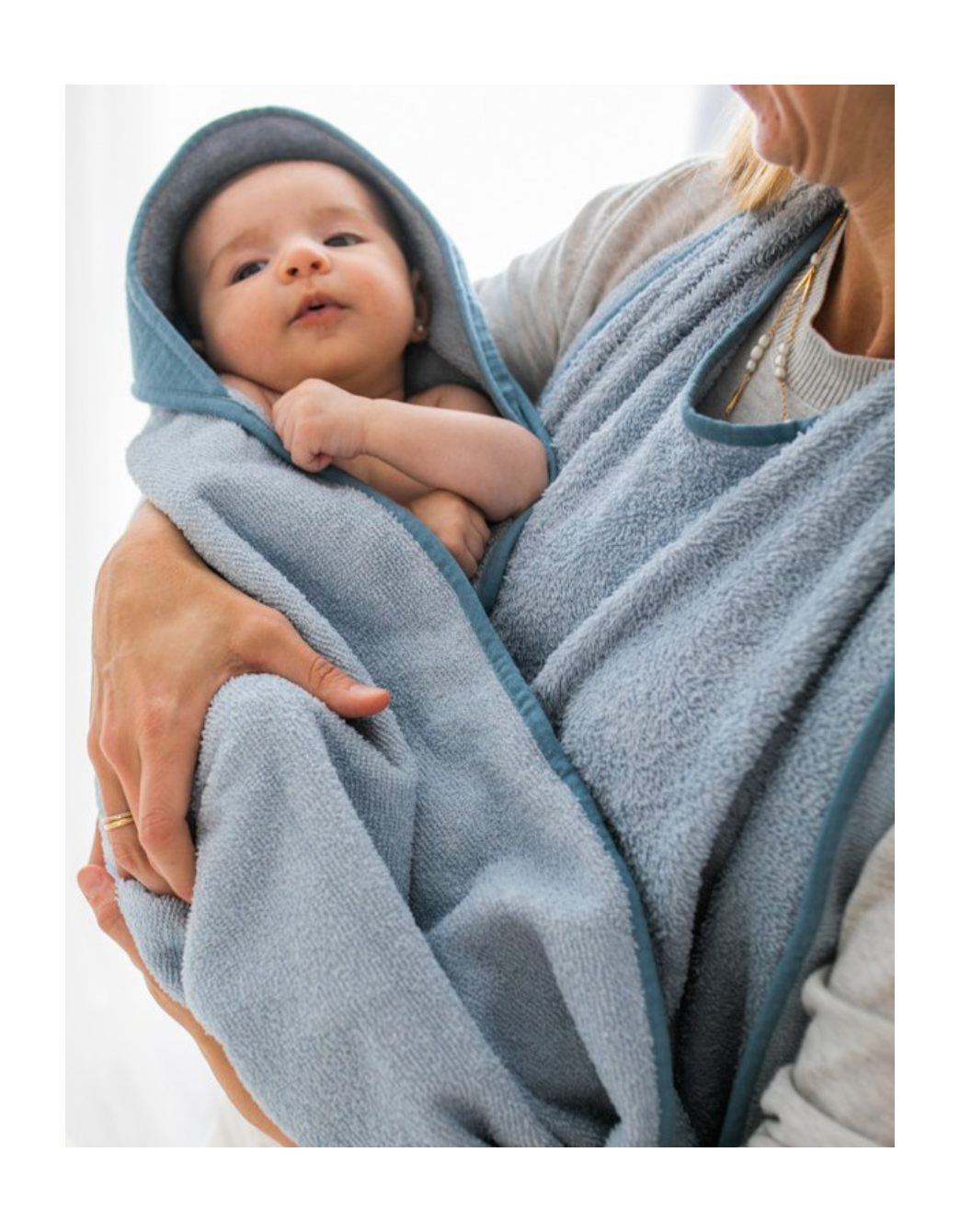 Toalla delantal bebé azul_algodón orgánico