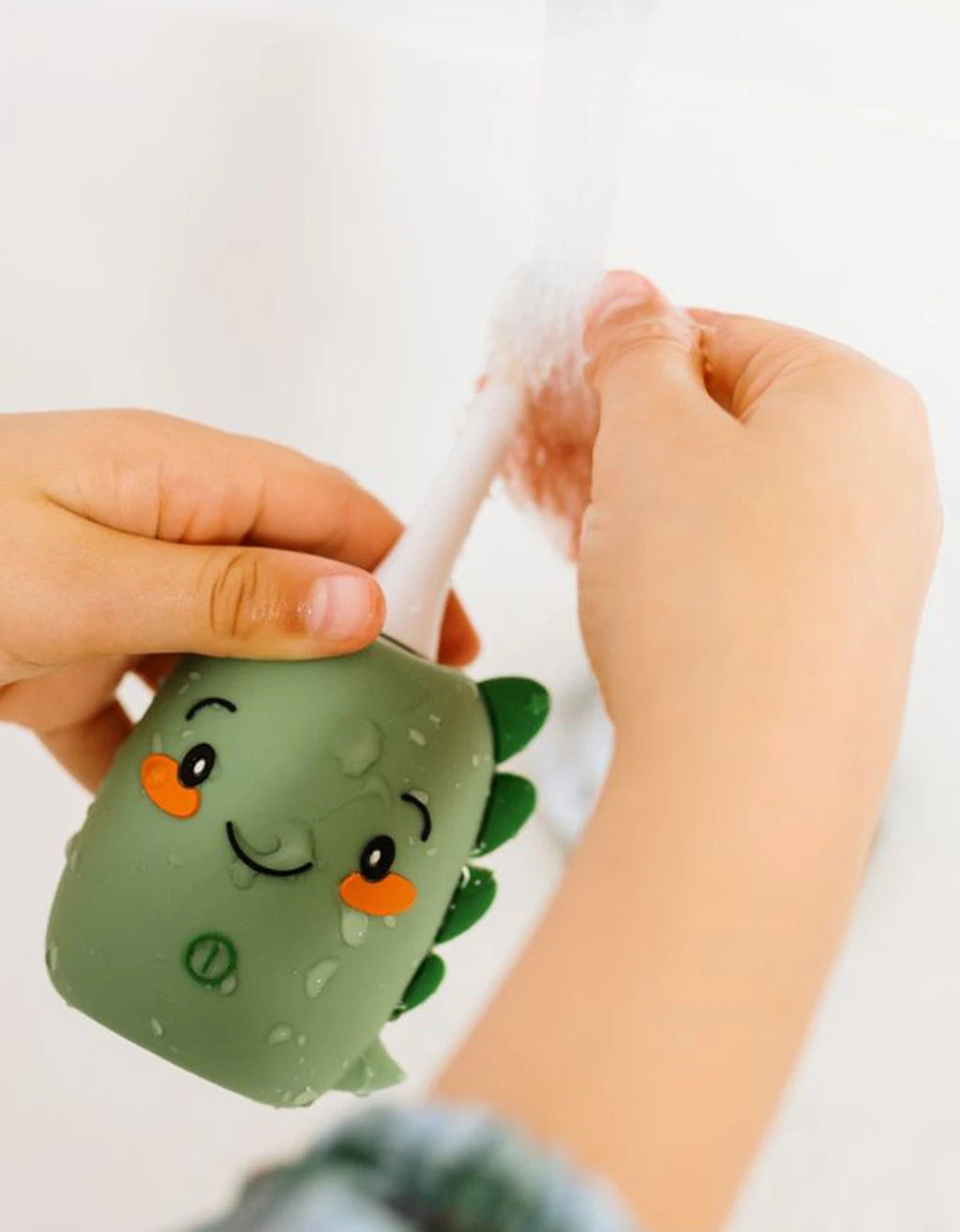 Cepillo de dientes eléctrico infantil - Dinosaurio