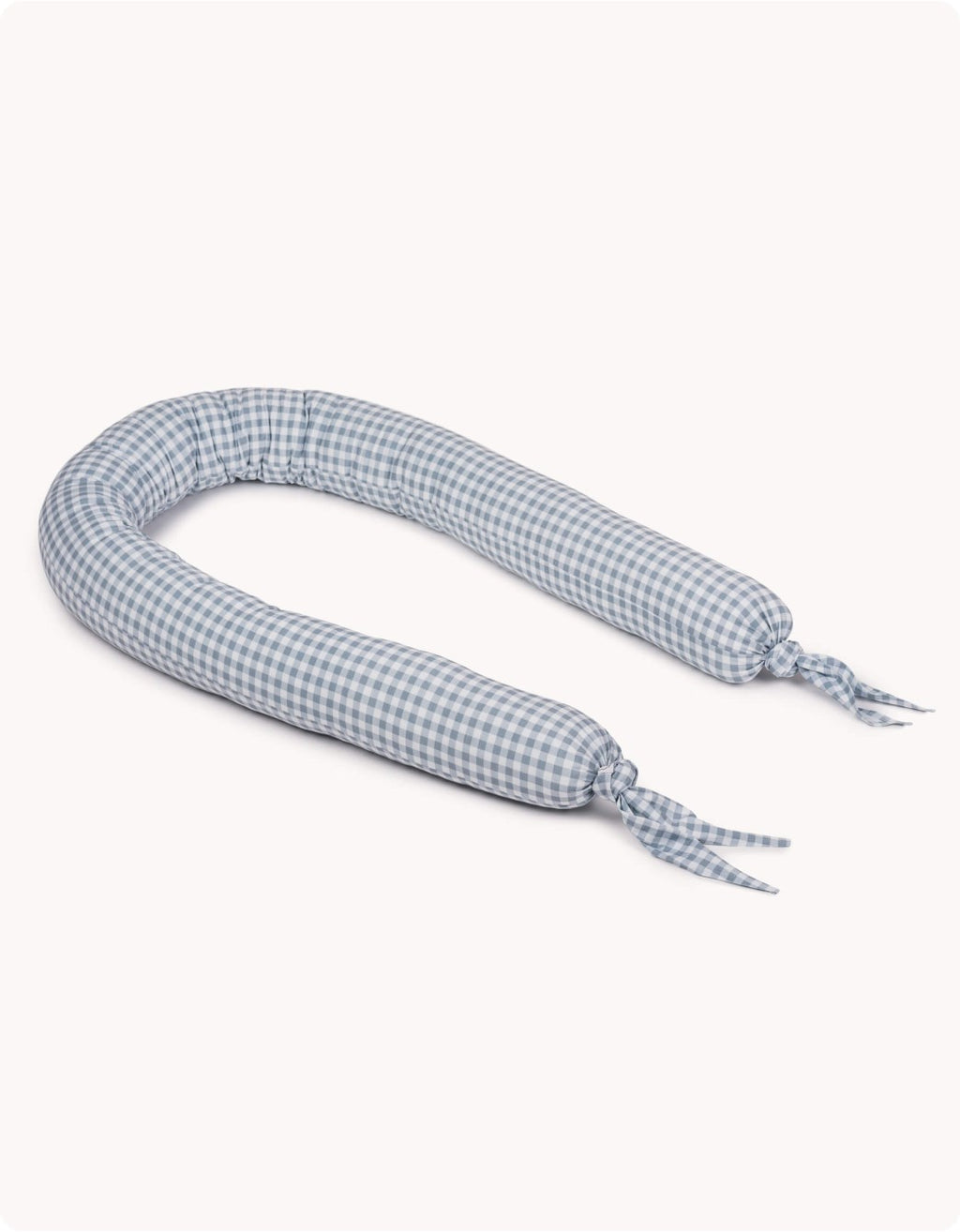Cojín protector Vichy Gris para cuna con estampado de cuadros vichy en algodón orgánico.