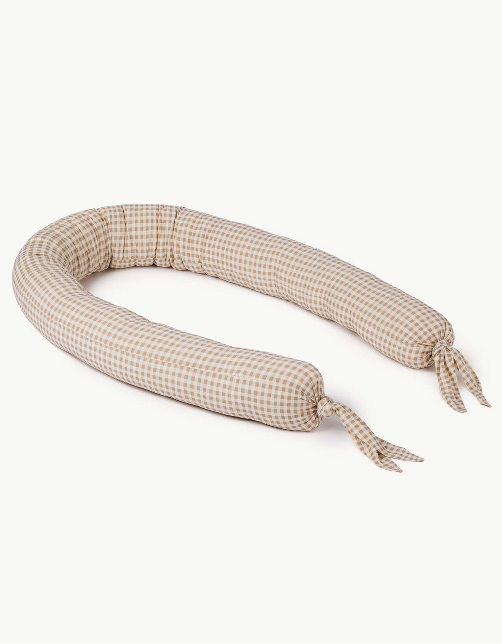 Cojín protector Vichy Sand para cuna con estampado de cuadros vichy en algodón orgánico.