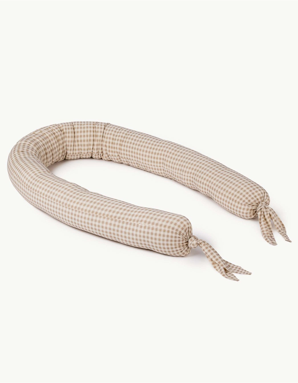 Cojín protector Vichy Sand para cuna con estampado de cuadros vichy en algodón orgánico.