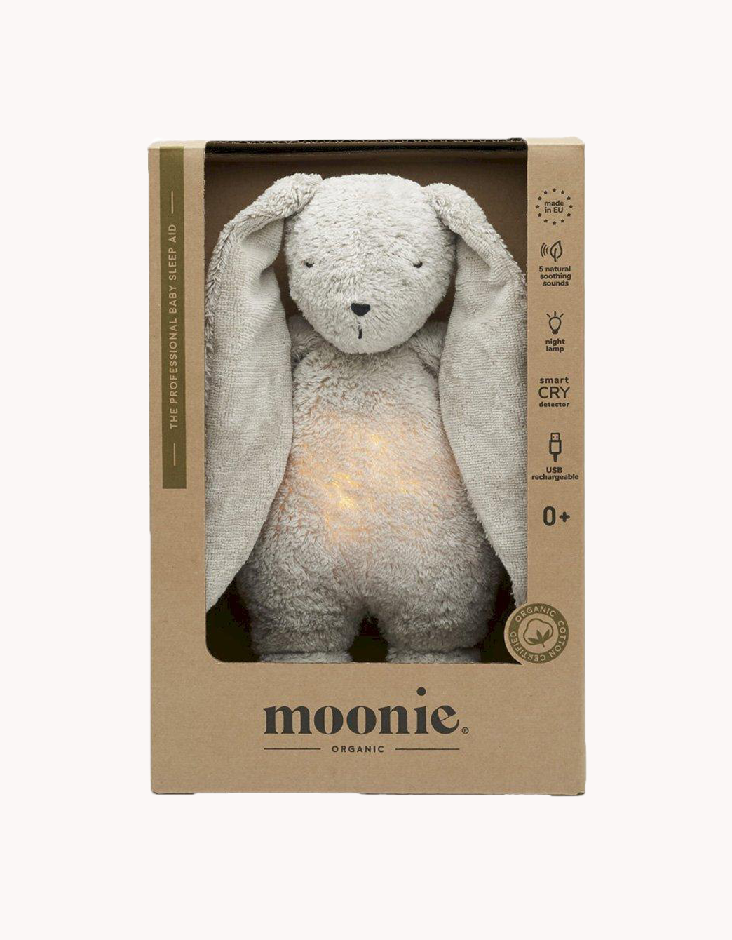 Conejito Polar gris con luz y sonido presentado en su embalaje original, listo para acompañar el descanso y la relajación del bebé.