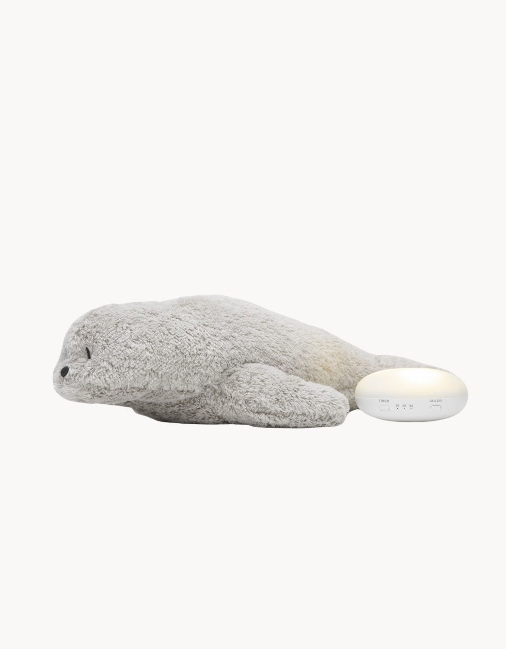Lámpara quitamiedos con sonido y proyector en forma de foca gris, con mando a distancia para controlar la luz y las melodías infantiles.