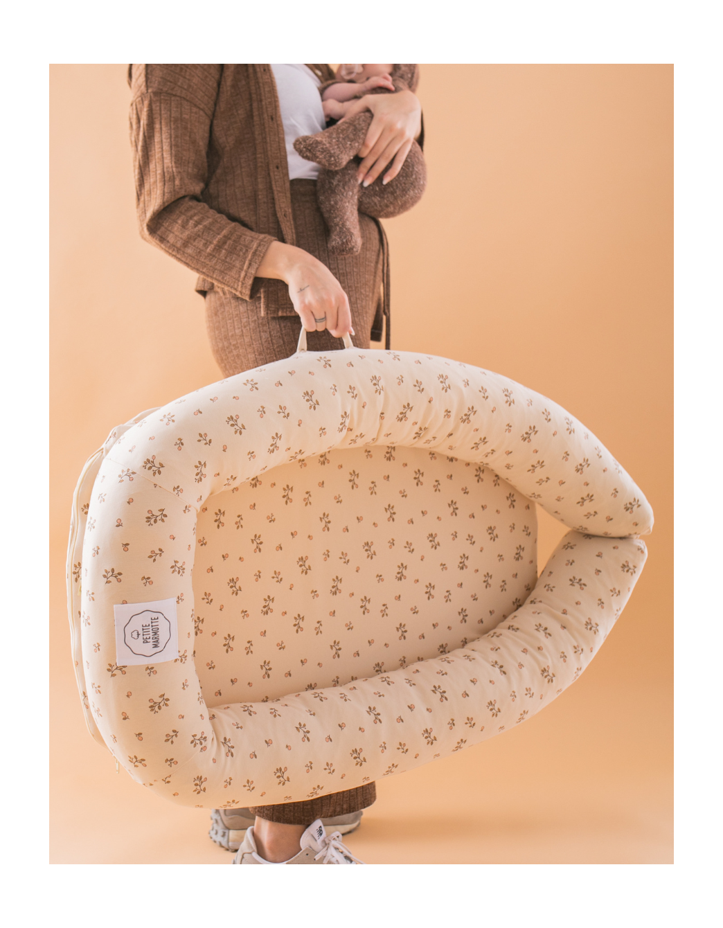 Minicuna nido Botanic de algodón orgánico fácil de transportar para el bebé.