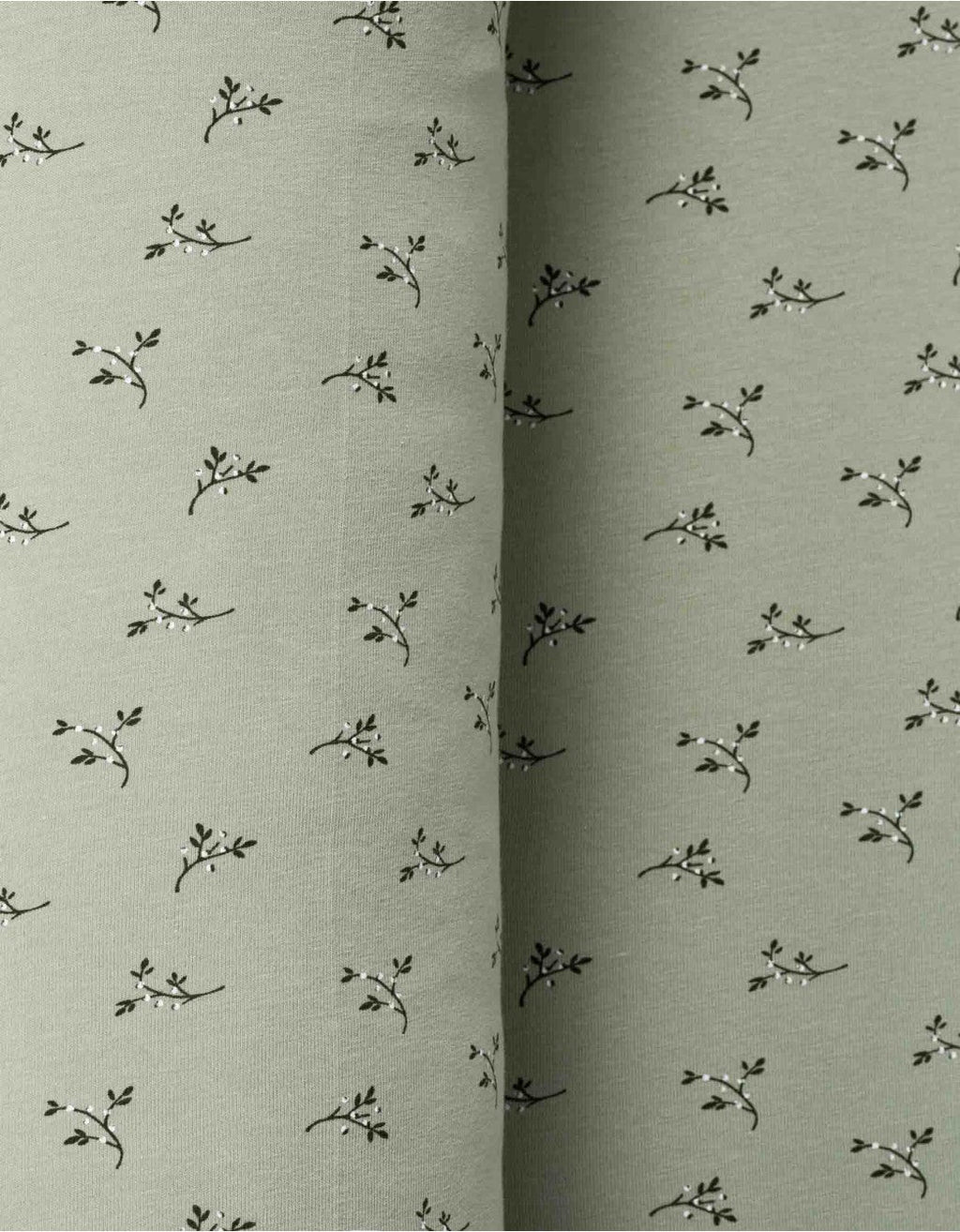 Detalle del estampado Olive sobre algodón orgánico para bebé.
