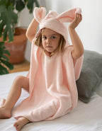 Poncho de toalla rosa