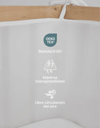 Detalle del protector de cuna Breath con tejido de malla 3D transpirable y libre circulación del aire para una mayor ventilación.