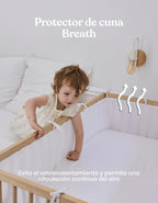 Protector de cuna Breath transpirable instalado en una cuna de bebé, diseñado para favorecer la circulación continua del aire.