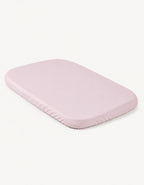Sábana bajera con protector impermeable para minicuna 50x90 cm color rosa.