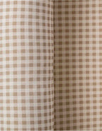Detalle del tejido Vichy Sand en saco de dormir bebé TOG 0,5