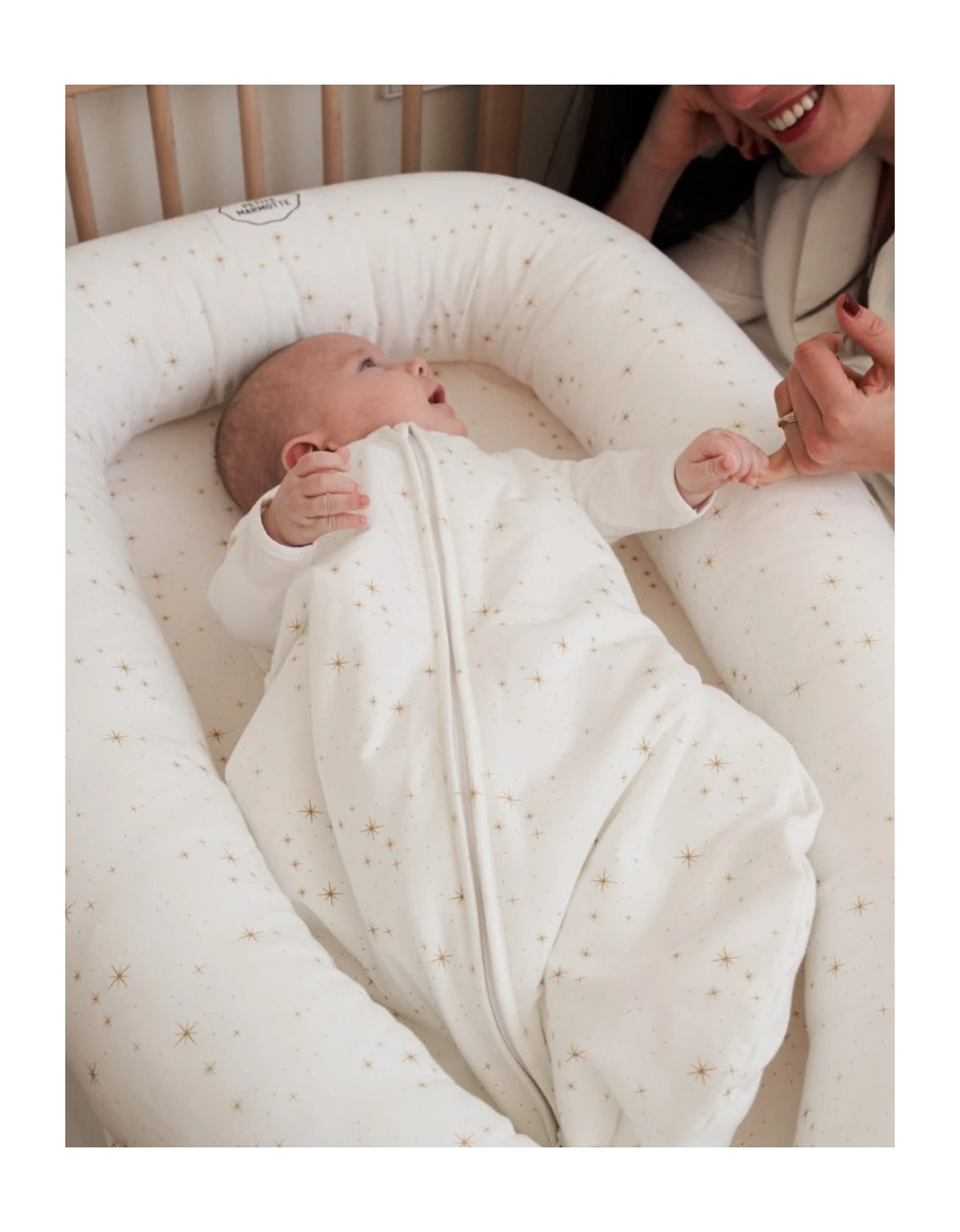 Bebé descansando en saco de dormir Stars TOG 2,5 de algodón orgánico.